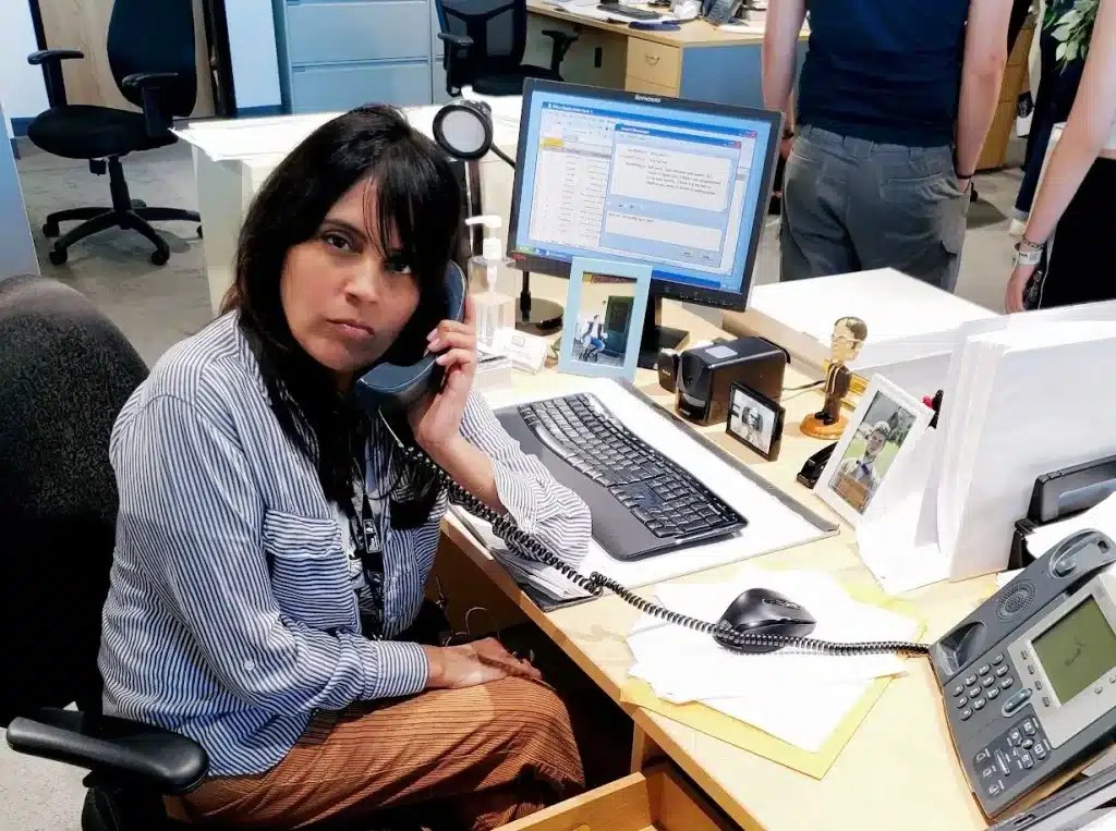 Should we be polite to AI:  Mar talking to a customer service bot on the recreated set of "The Office"